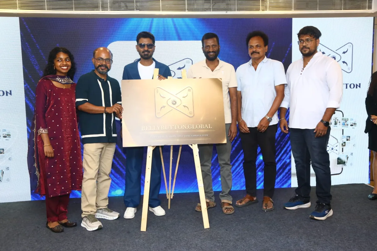 The BellyButton.Global plaque unveiled on stage, surrounded by the launch guests